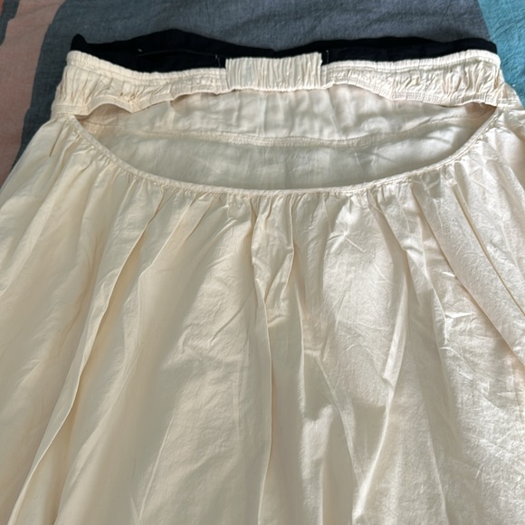 Maeve Strapless Pintuck Open-Back Dress. Color is Ivory with Black bodice trim. - Picture 3 of 5